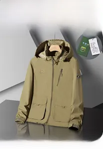 Detail of khaki outdoor hooded jacket with breathable mesh lining and brand embroidery