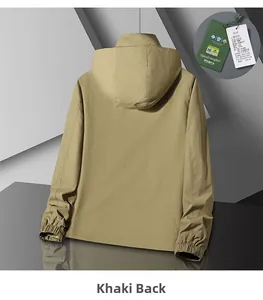 Detail view of khaki hooded windbreaker back featuring elastic cuffs and designer tag