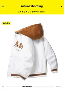 Close-up of a white varsity jacket with brown hood and AM EXPLORE.07 lettering