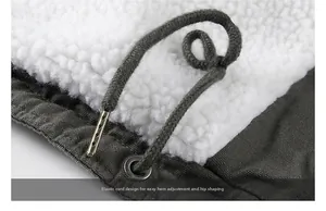 Close-up of winter jacket featuring warm white fleece lining and adjustable drawstring
