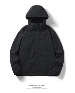 Detail of fleece-lined collar and multi-layer down-proof tech on black hooded jacket
