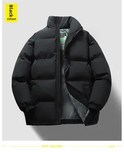Detailed view of black stand-collar puffer jacket featuring windproof fabric and elastic cuffs