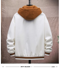Back view of a white hooded jacket featuring contrasting caramel brown hood and striped ribs