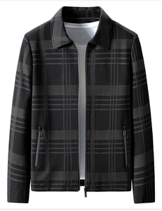 Detail showing high-quality zipper and classic plaid pattern on men's casual grey jacket