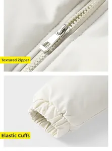 Detail showing high-quality metallic zipper and elastic cuffs of a padded jacket