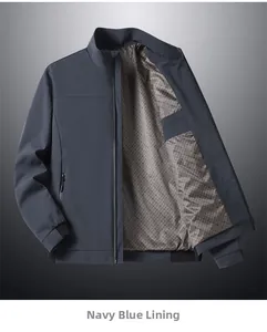 Detail view of navy blue stand-collar jacket with classic plaid lining and smooth zipper