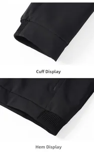 Detailed macro view showing the ribbed cuffs and hem of this black casual men's jacket
