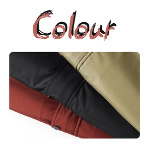 Detail view of khaki, black, and red quilted work jackets with round button closures