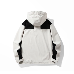 Men's outdoor hooded jacket with black and white color block design, back view