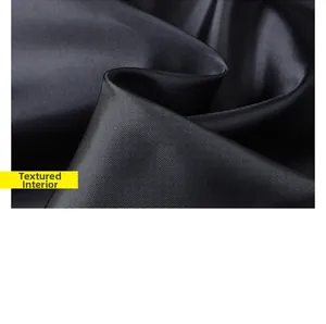 Macro shot of high-quality black silky lining fabric with honeycomb texture and metallic luster