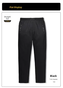 Detail of black men's down trousers with drawstring waist and white zipper accents