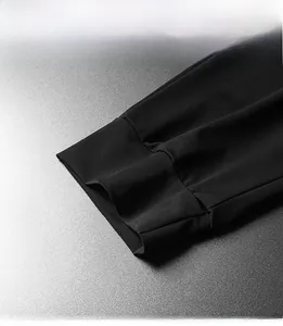 Detailed close-up of the hemmed cuff on men's quick-dry ice silk casual trousers