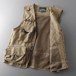 Detail view of khaki tactical vest featuring breathable mesh lining and utility pockets
