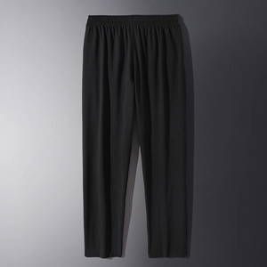 Men's casual black elastic waist trousers with a relaxed straight-leg fit and drape