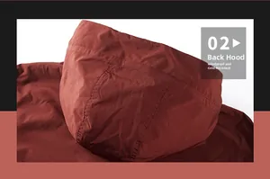 Detailed close-up of the windproof hooded back on a warm burgundy outdoor work jacket