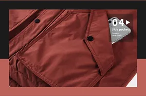 Detail of dark red work jacket featuring a large functional pocket with a metal snap button