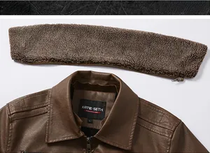 Close-up of brown PU leather jacket with a removable faux fur collar and metal zipper