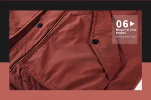 Detail of reddish-brown work jacket featuring a secure slanted pocket with metal button
