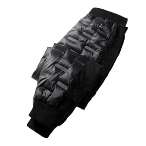 Men's quilted down pants in black with thermal fleece lining and ribbed ankle cuffs