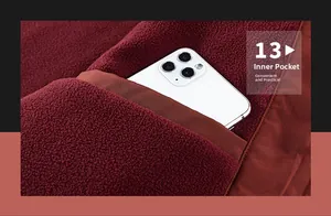 Detail showing inner pocket of the burgundy jacket with warm fleece lining material