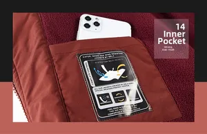 Detail of inner security pocket on burgundy fleece jacket for outdoor warmth