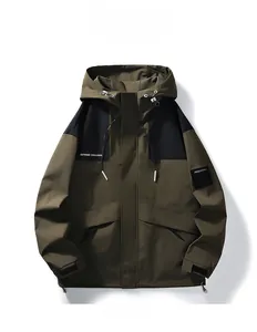 Detail of army green outdoor jacket featuring black contrast stitching and adjustable hood