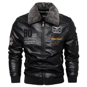 Detail of men's slim fit PU leather bomber jacket with fleece collar and patches