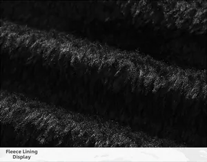 Macro detail of high-density black inner fleece lining for warmth and thickness