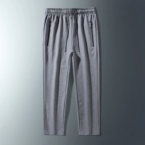 Men's dark grey knit jogger pants with elastic drawstring waist and side zip pockets