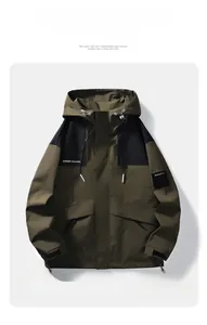Detail of waterproof outdoor jacket with windproof hood and contrast stitching