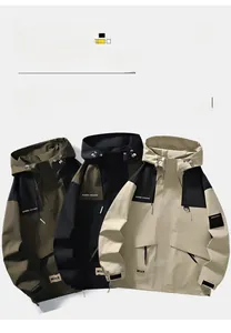 Detail of three waterproof outdoor jackets with adjustable hoods and large cargo pockets