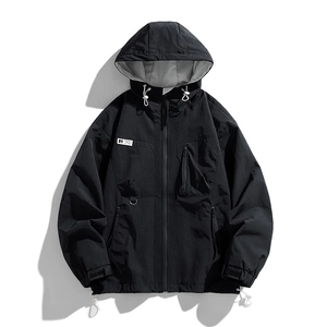 Mens black hooded windbreaker jacket with waterproof fabric and utility pockets