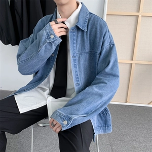Men's light blue vintage denim jacket with a relaxed fit and classic collar design