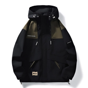 Waterproof outdoor hooded windbreaker jacket with contrast green and black panel design