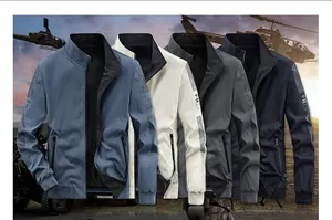 Detail view of reversible men's stand collar jackets in blue, white, gray, and navy colors