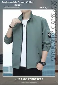 Detail of green outdoor jacket showing sport utility arm pocket and ribbed cuffs