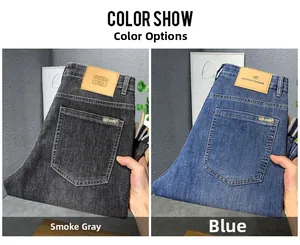 Détails de jeans slim droits gris fumé et bleu avec des patchs de marque en cuir