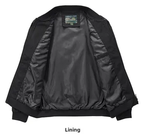Detailed view of black jacket lining with size M label and ribbed cuffs and hem