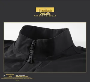 Detail of black stand collar jacket with windproof fabric and zipper strap detail