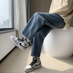 Retro washed blue straight leg jeans for men with a relaxed wide leg fit and cropped length