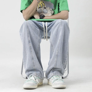 Men's light blue wide-leg jeans with drawstring waist and loose straight fit design
