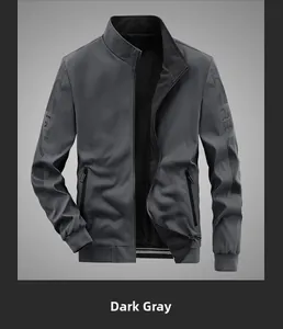 Detail of dark gray reversible bomber jacket with FREE sleeve print and ribbed cuffs