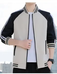 Detail shot of the contrast color baseball jacket with ribbed cuffs and zipper