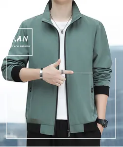 Close-up of olive green slim fit men jacket with ribbed cuffs and stand collar detail
