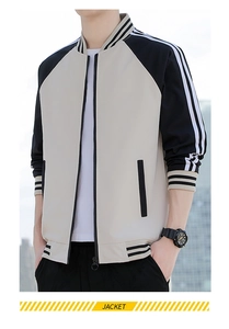 Detailed view of the baseball jacket showing contrast sleeves and striped ribbed cuffs