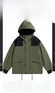 Close-up of windproof hooded jacket featuring waterproof fabric and olive green black stitching