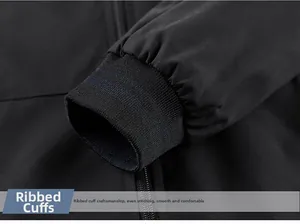 Detail of black ribbed knit cuffs on reversible casual jacket with uniform stitching