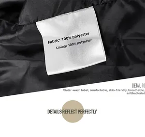 Detail view of garment wash label showing 100% polyester fabric composition