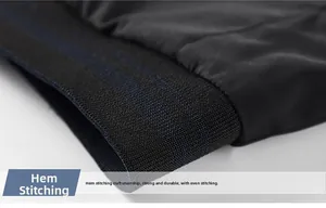 Macro shot of durable hem stitching and ribbed texture on reversible casual jacket