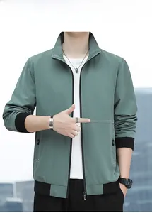 Close-up of Morandi green utility jacket showing ribbed collar and contrast stitching details